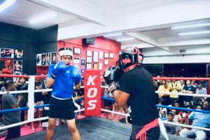 Determined Boxers Preparing for Intense Sparring in the Boxing Ring