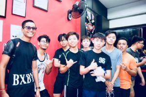 Boxing Fans Strike a Pose for the Camera, Excitement in the Air