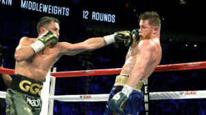 GGG delivers a potent blow to Canelo, while Canelo defends with tenacity.