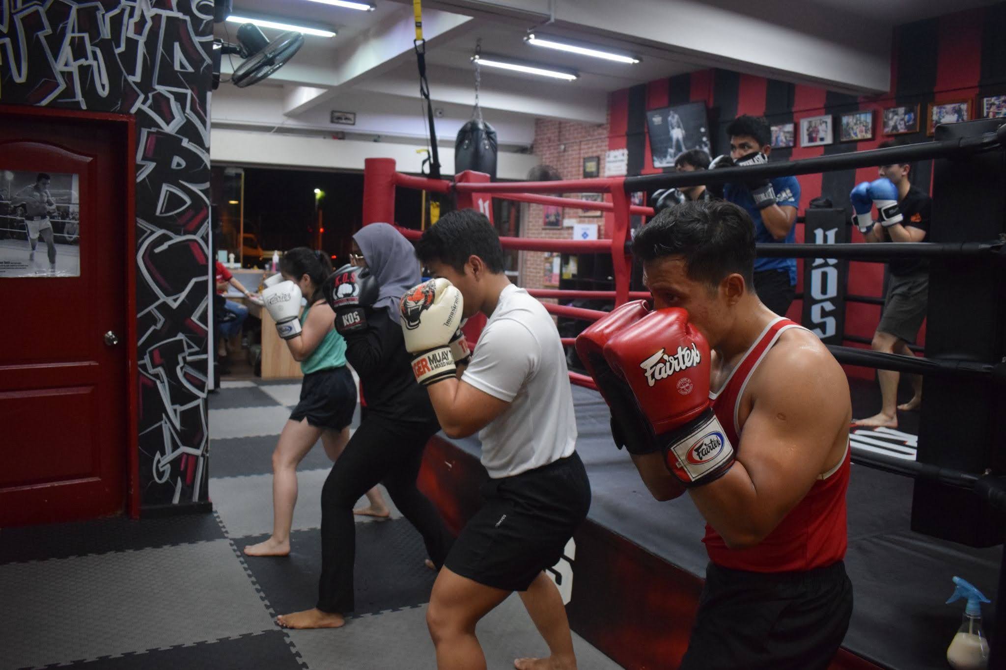 boxing class participants training at boxing gym in singapore